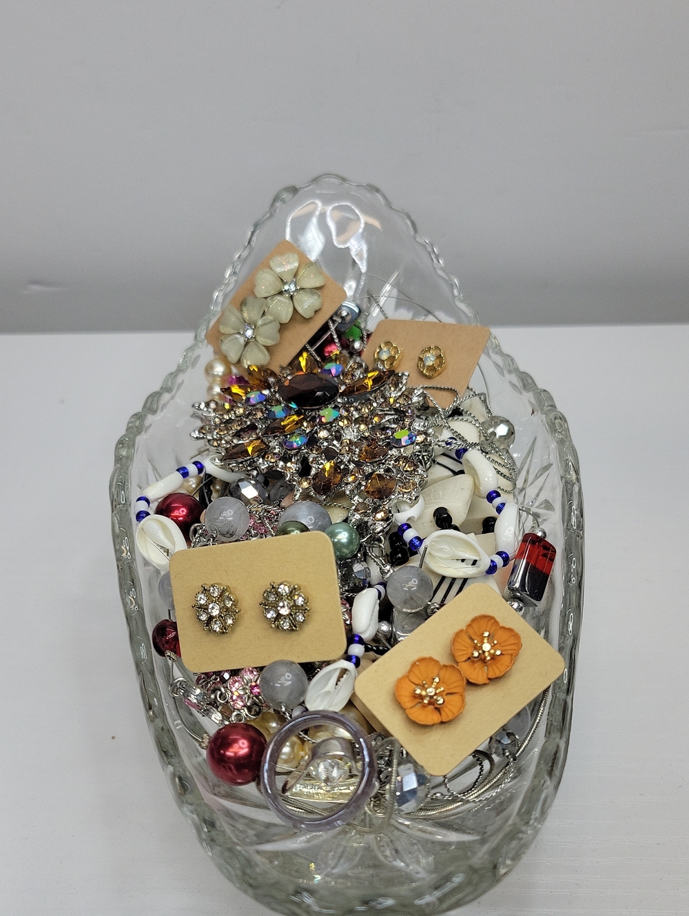 Glass Dish Filled With Jewelry